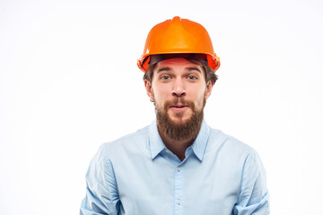 man in shirt orange helmet engineer professional work