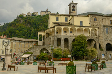 Fototapeta premium St. Gaudenzio church and Sacred mountain sanctuary on background, Varallo Sesia village, Piedmont, Italy