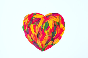 Creative concept autumn heart with leaves. Colorful leaves. Valentine concept.