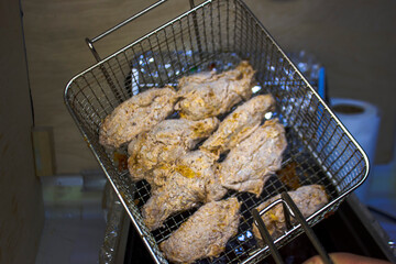 process of preparation and frying, delicious and crisp wings