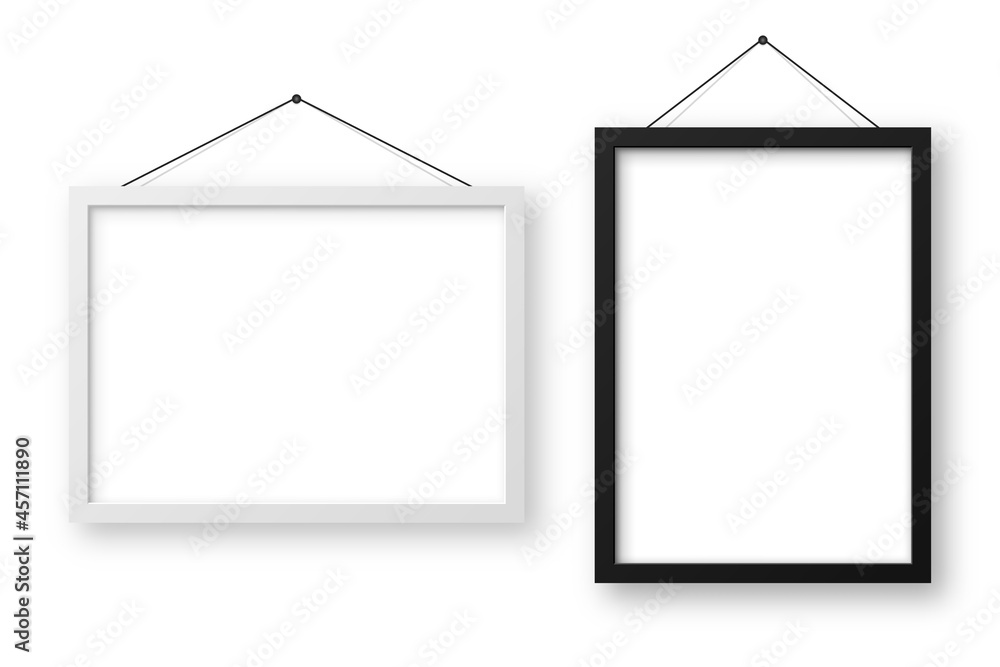 Wall mural Realistic black and white picture frames with shadow. Hanging on a wall blank poster mockup. Empty photo frame. Vector illustration.