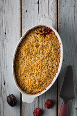 Home baked plum tart concept, traditional home cooking