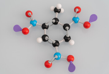 Isolated TNT molecule made by molecular model on gray background - obrazy, fototapety, plakaty