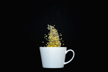 Blank white ceramic mug with yellow crystals and glitter