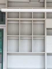 empty shelf on a wall