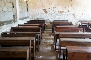 Fototapeta na wymiar Poor school classroom with no children inside