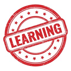 LEARNING text on red grungy vintage round stamp.