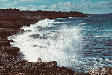 Sea splashing on rocks