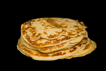 pancakes isolated on black background, side view