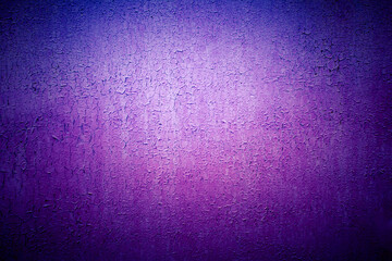 Old purple wall in spots, cracks, stains. Painted concrete wall in abstract grunge style loft....