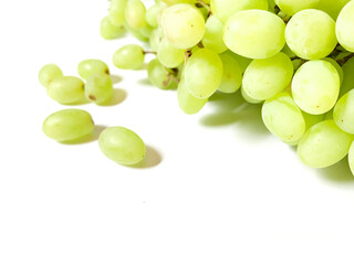 Fresh green grapes on the white background