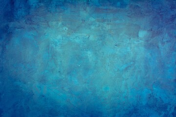 Old blue wall in spots, cracks, stains. Painted concrete wall in abstract grunge style loft. Vintage wall background texture for backgrounds, portraits, posters.