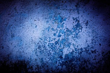 Old blue wall in spots, cracks, stains. Painted concrete wall in abstract grunge style loft. Vintage wall background texture for backgrounds, portraits, posters.