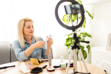 Female Vlogger Recording Broadcast At Home