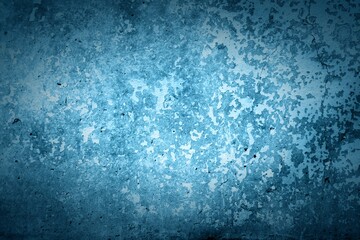 Old blue wall in spots, cracks, stains. Painted concrete wall in abstract grunge style loft. Vintage wall background texture for backgrounds, portraits, posters.