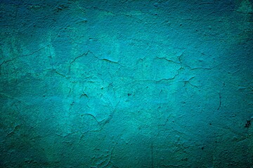 Old green wall in spots, cracks, stains. Painted concrete wall in abstract grunge style loft. Vintage wall background texture for backgrounds, portraits, posters.