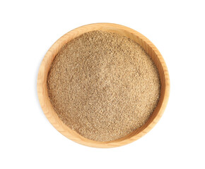 Wooden bowl with powdered coriander on white background, top view