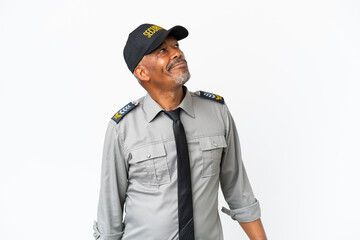 Fototapeta premium Senior staff man isolated on white background and looking up