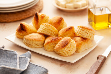 Bunch of small homemade greek cheese puff pastry pies