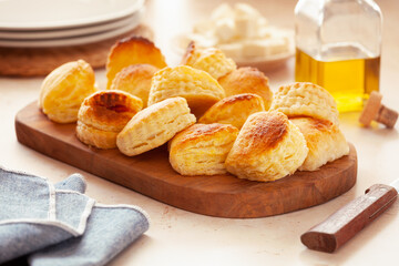Bunch of small homemade greek cheese puff pastry pies
