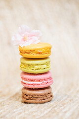 Colorful macaroons on light background