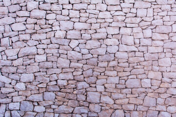 Stone wall of large unpolished stones