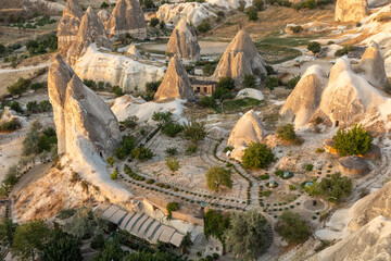 Cappadocia, Turkey - September 1, 2021 - Cappadocia Panoramic - Hot air balloon flying in early...