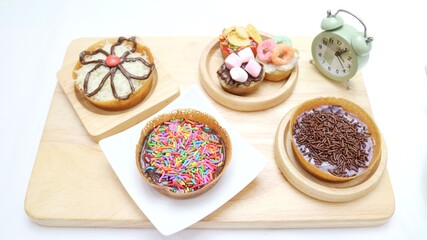 Martabak Mini or Martabak Mini Bangka with various Topping. The martabak mini bangka is made from a mixture of flour, eggs, sugar, baking soda, coconut milk and water.