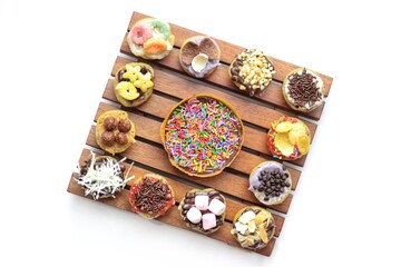 Martabak Mini or Martabak Mini Bangka with various Topping. The martabak mini bangka is made from a mixture of flour, eggs, sugar, baking soda, coconut milk and water.