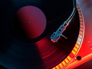 turntable dj top view needle with red and blue light