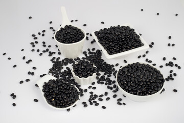 Black Beans on pot. white background