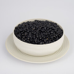 Black Beans on a plate on white background