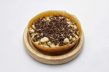 Martabak Mini or Martabak Mini Bangka with various Topping. The martabak mini bangka is made from a...