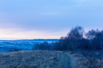 Kislovodsk, Russia. December 28, 2018. Evening view from a high mountain to the mountains and forest of Kislovodsk.