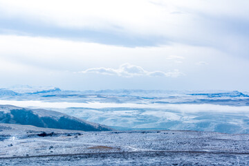 Kislovodsk, Russia. December 28, 2018. Majestic mountain peaks in the fog.