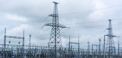 An electrical substation transmits electricity through a power line