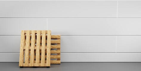 Wooden pallets along wall on warehouse. Warehousing service equipment for storage, shipping and safe transportation. Realistic of interior room with white tile wall and grey floor in factory or store
