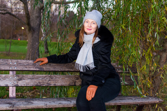 Russia, the village of Arkhangelskoe. October 7, 2020. Portrait of a beautiful woman in autumn in the park in nature.