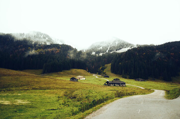 GERMANY, MUNCHEN: Scenic landscape view of autumn foggy Bavarian Alp mountains  