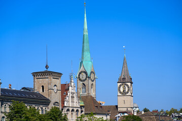 Fototapeta na wymiar Protestant churches St. Peter and Women's Minster at the old town of Zurich at a beautiful late summer day. Photo taken September 6th, 2021, Zurich, Switzerland.