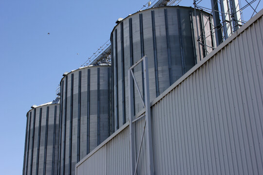   Industrial food and grain storage. Stainless steel tanks.