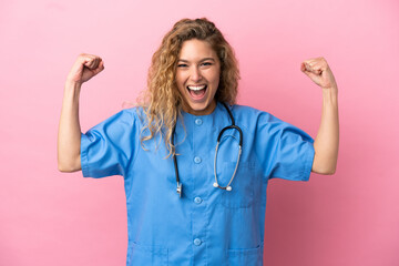 Young surgeon doctor woman isolated on pink background doing strong gesture