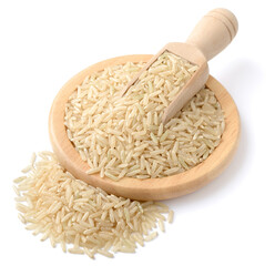 raw long brown rice in the wooden spoon, isolated on the white background