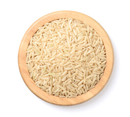 raw long brown rice in the wooden plate, isolated on the white background, top view