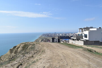 View of the Black Sea and the city. The resort town of Anapa. Russia. Photo taken in spring.