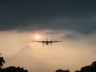Fototapeta na wymiar Airplane Landing in Taipei city, Taiwan.