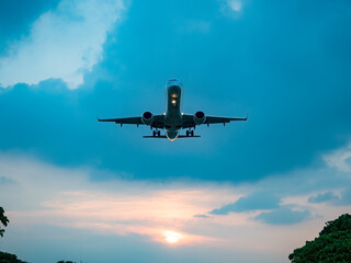 Fototapeta na wymiar Airplane Landing in Taipei City, Taiwan.