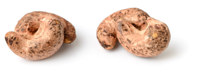 roasted cashew nuts with peel isolated on the white background