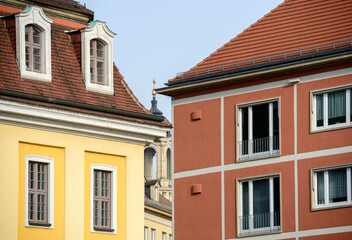 Narrow gap between bright buildings and Frauenkirche in it, Dresden.