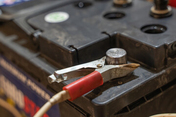 Obraz na płótnie Canvas Close up of battery car terminal, Battery charging.